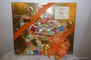 La festa di San Martino a Venezia raccontata da una veneziana Dolce di San Martino decorato con caramelle e confettini, con fiocco arancione
